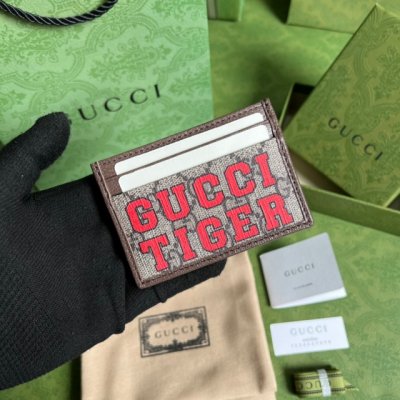 [Gucci] ���� Ÿ�̰� ī������ 673002